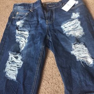 Ripped blue jean shorts New